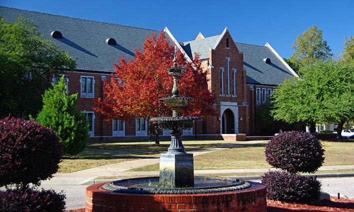 fountain, red tree, and Smith Hall